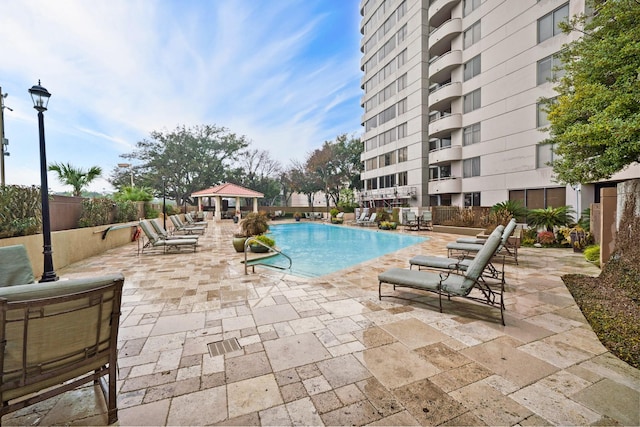 view of pool with a gazebo and a patio area