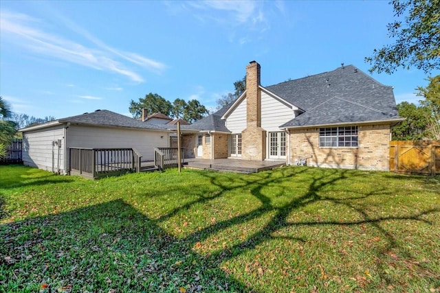 back of property featuring a patio area and a yard