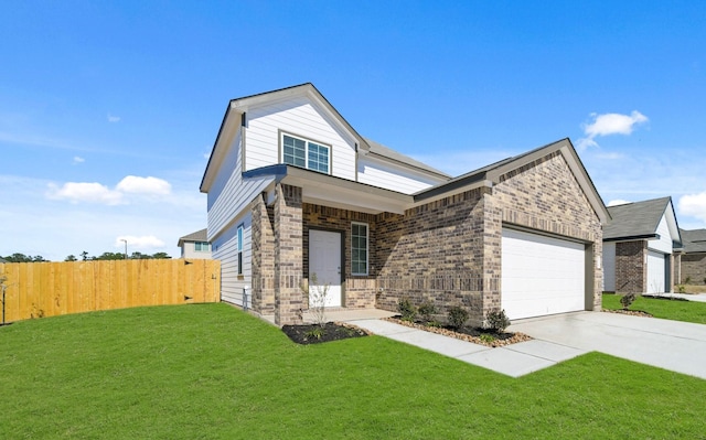 view of front facade with a garage and a front lawn