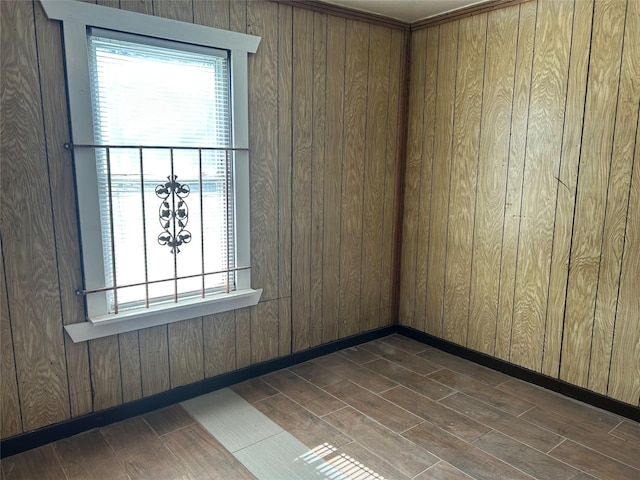 empty room with wooden walls