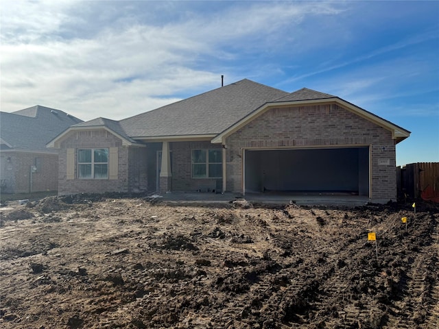 single story home with a garage