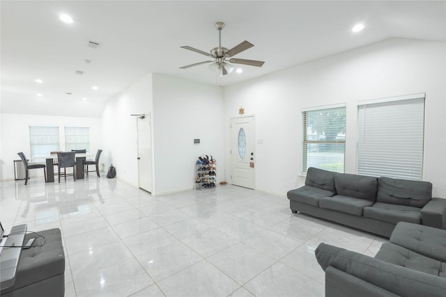 living room with high vaulted ceiling and ceiling fan