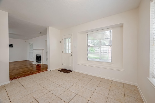 entryway featuring light tile patterned flooring