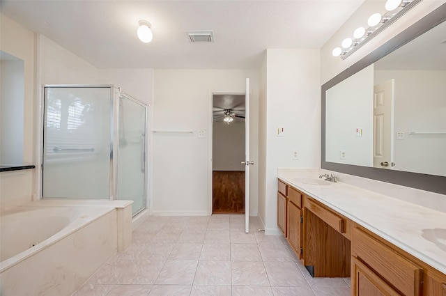 bathroom featuring vanity, ceiling fan, and plus walk in shower