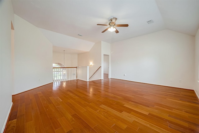 spare room with hardwood / wood-style floors, ceiling fan, and lofted ceiling