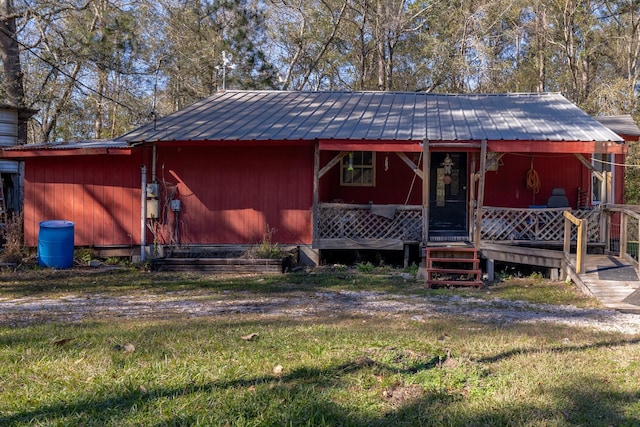 back of house with covered porch