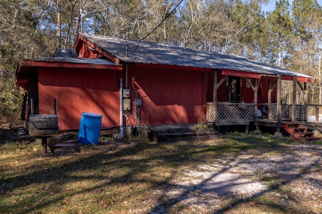 exterior space with a yard and a porch