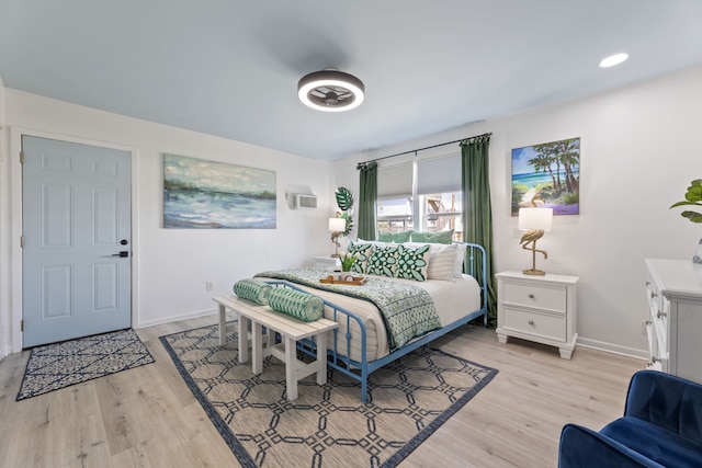 bedroom with light hardwood / wood-style flooring