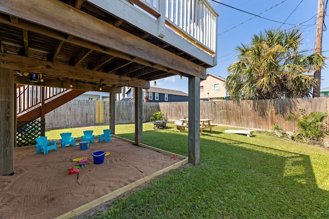 view of yard with a fire pit