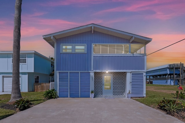 view of front of home featuring a yard