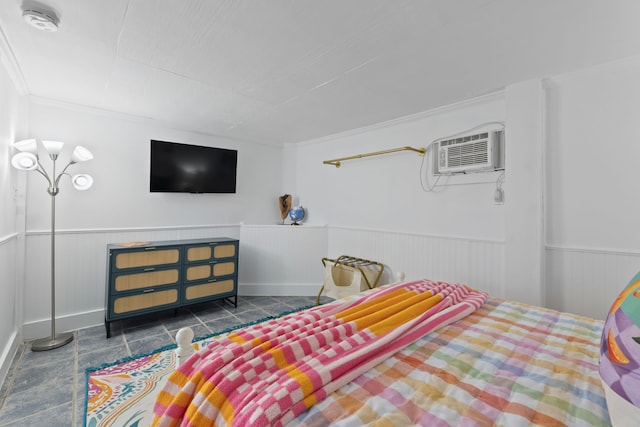 bedroom with an AC wall unit and ornamental molding