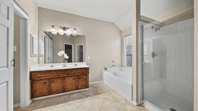 bathroom with vanity, vaulted ceiling, tile patterned floors, and shower with separate bathtub