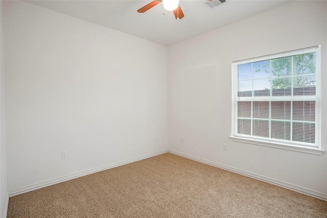 carpeted empty room with ceiling fan