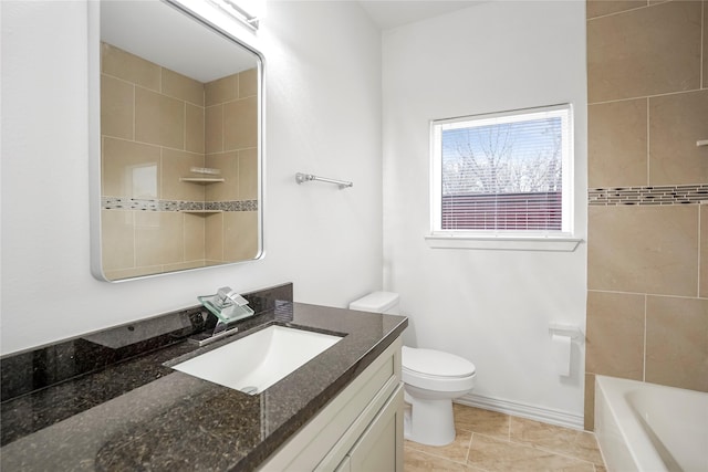 full bathroom with tile patterned flooring, vanity, tiled shower / bath combo, and toilet