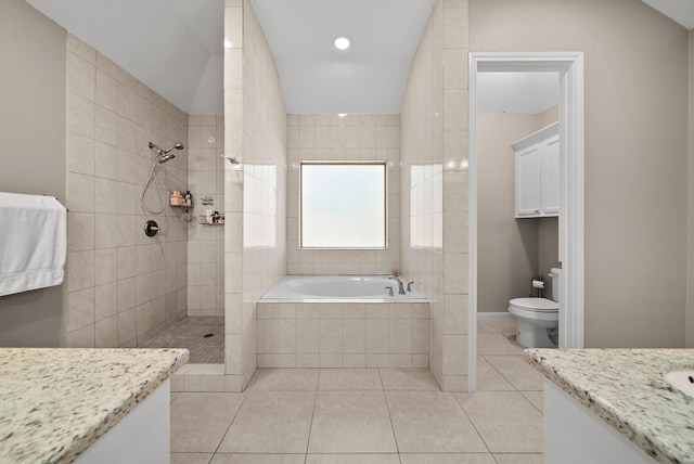 full bathroom featuring tile patterned flooring, vanity, toilet, and shower with separate bathtub