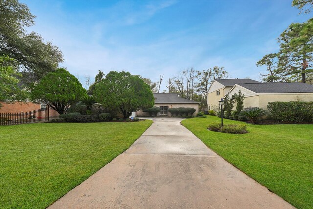 view of front of home with a front lawn