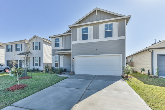 view of front of home featuring a front lawn and a garage