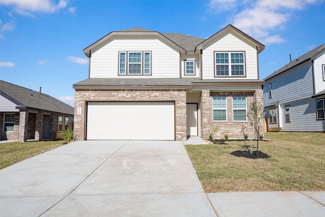 view of front of house with a garage and a front lawn