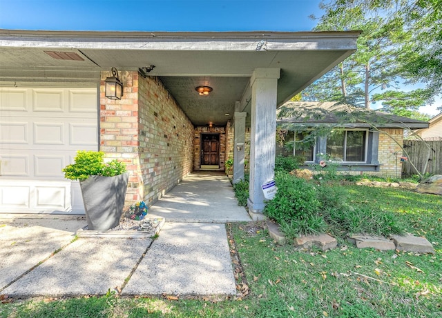 doorway to property featuring a garage