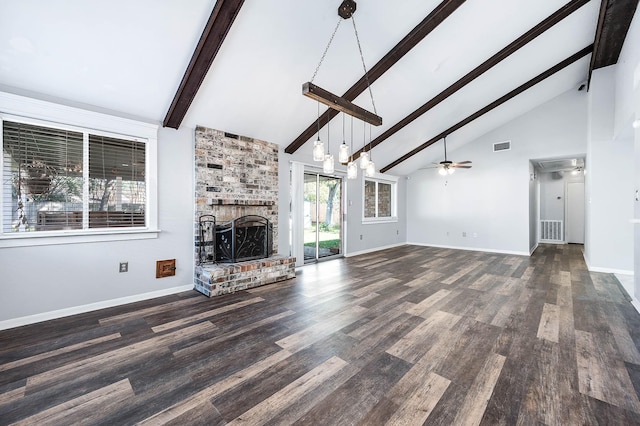 unfurnished living room with a brick fireplace, ceiling fan, beam ceiling, high vaulted ceiling, and dark hardwood / wood-style floors