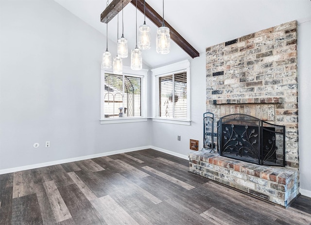 unfurnished living room with vaulted ceiling with beams, dark hardwood / wood-style flooring, and a brick fireplace