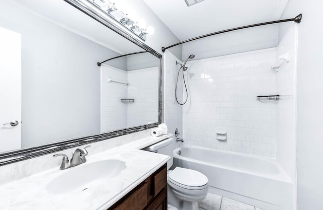 full bathroom with tile patterned floors, vanity, toilet, and tiled shower / bath combo