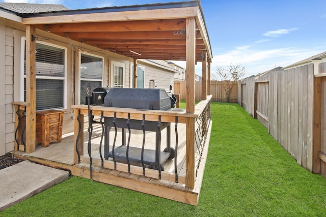 exterior space featuring a lawn and area for grilling