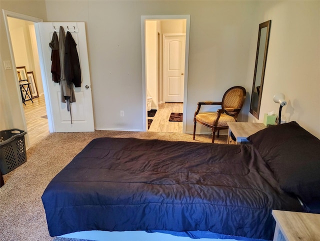 bedroom with light colored carpet