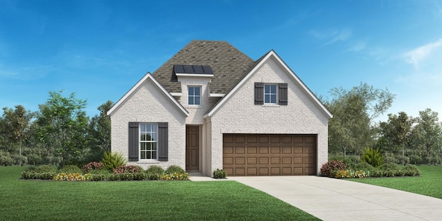 view of front facade featuring a garage and a front lawn