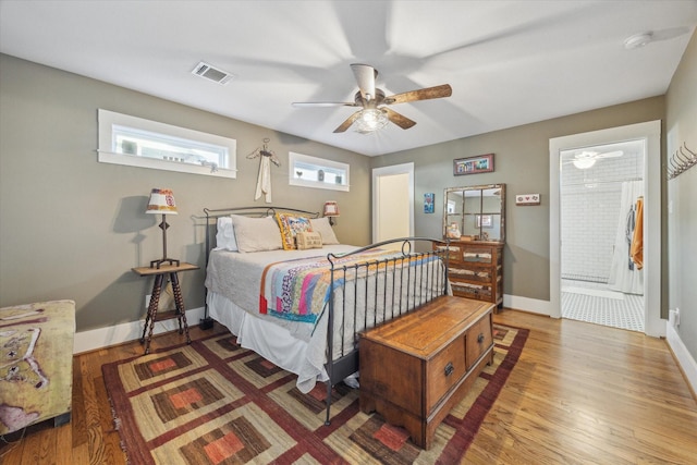 bedroom featuring ceiling fan and dark hardwood / wood-style flooring