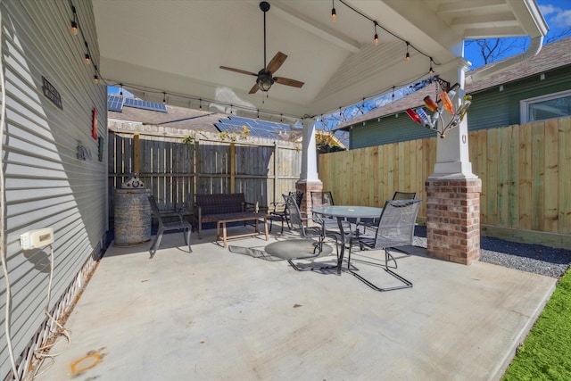 view of patio featuring ceiling fan