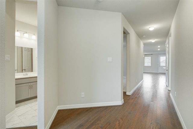 hallway featuring hardwood / wood-style floors