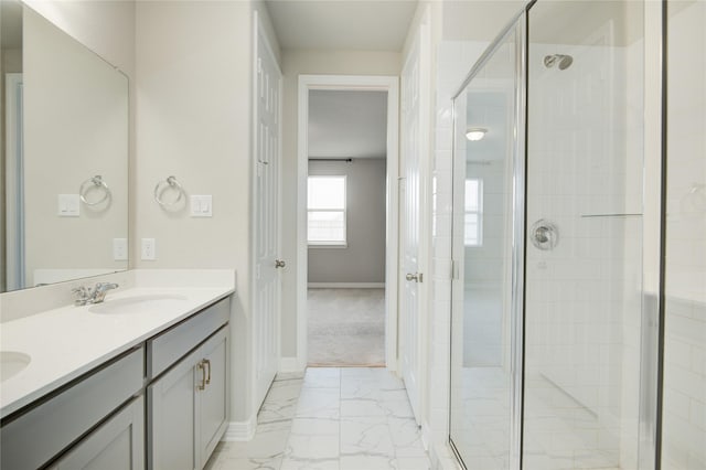 bathroom with vanity and walk in shower