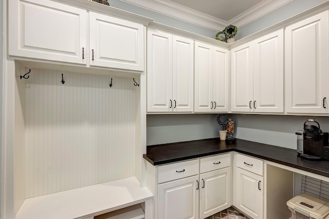 mudroom featuring crown molding