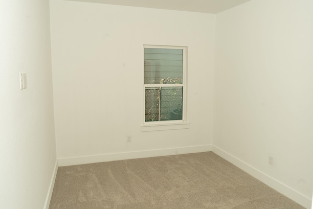 empty room with carpet floors