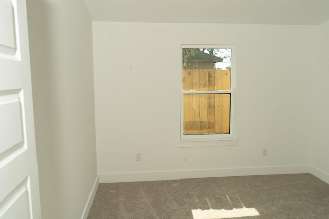 unfurnished room featuring carpet floors