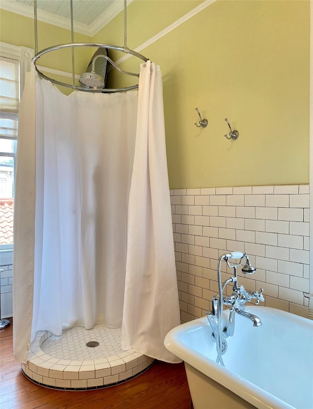 bathroom featuring wood-type flooring, a shower with curtain, ornamental molding, and sink