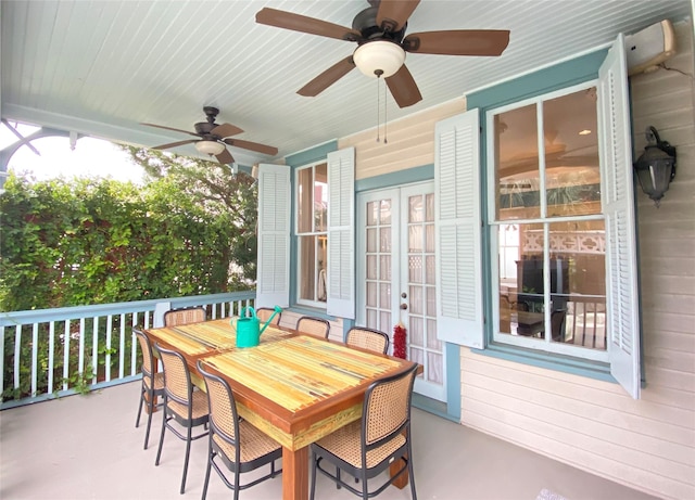 view of patio featuring ceiling fan and french doors