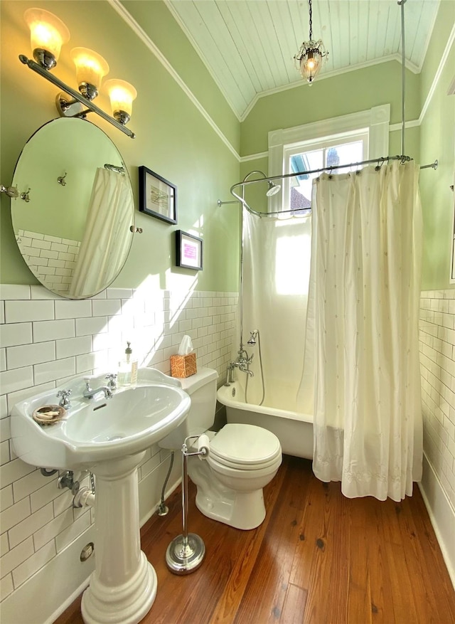 bathroom with crown molding, toilet, wood ceiling, shower / tub combo, and hardwood / wood-style flooring