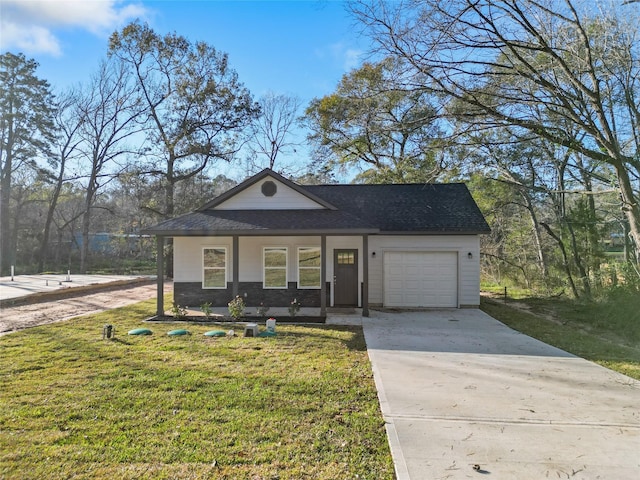 view of front facade featuring covered porch, a garage, and a front yard