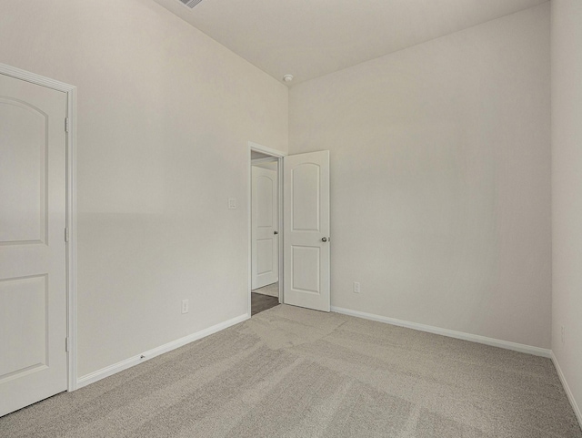 spare room with carpet floors