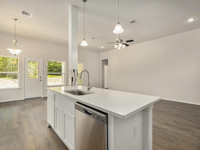 kitchen with sink, pendant lighting, dishwasher, white cabinetry, and an island with sink