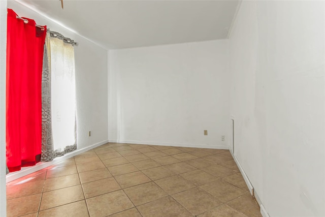 empty room featuring light tile patterned flooring