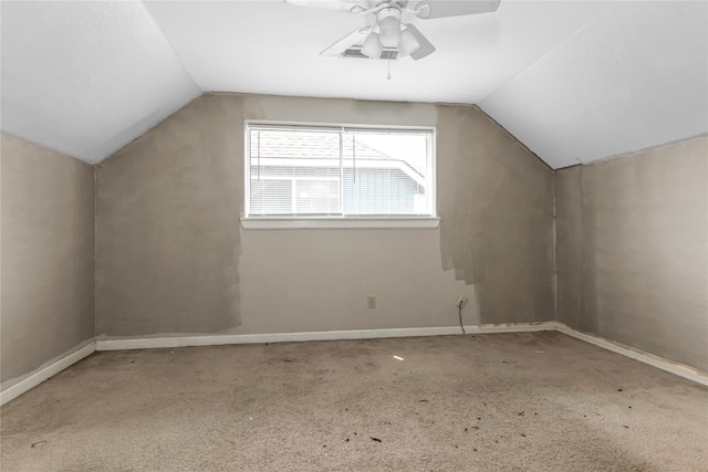 additional living space with ceiling fan and lofted ceiling