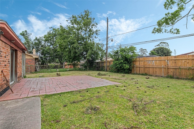 view of yard with a patio area