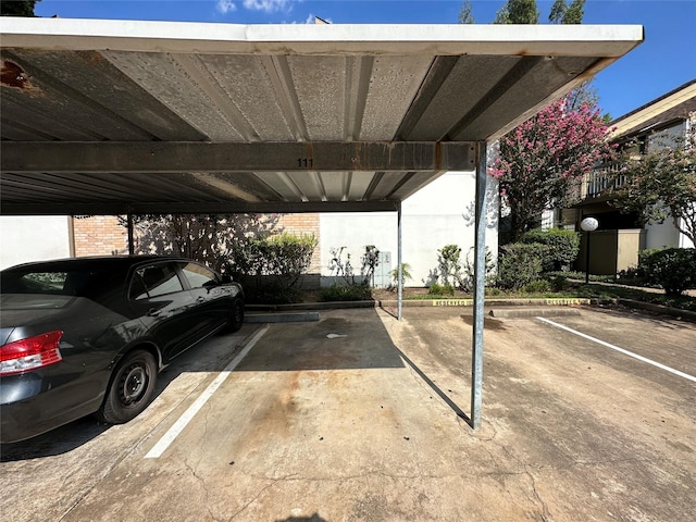 view of parking with a carport