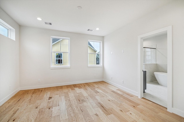 empty room featuring light hardwood / wood-style floors