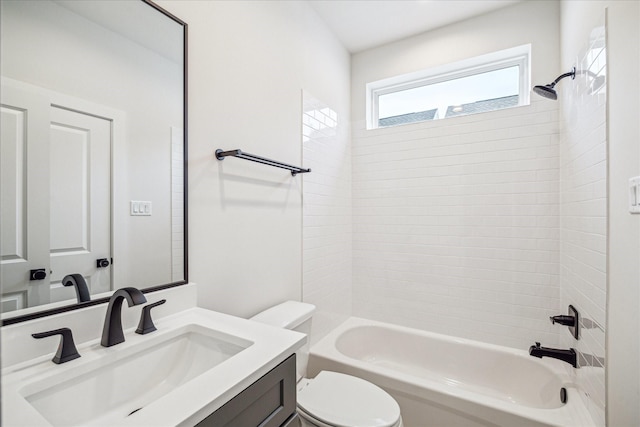 full bathroom featuring toilet, vanity, and bathtub / shower combination