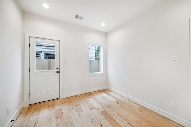 foyer entrance featuring light wood-type flooring