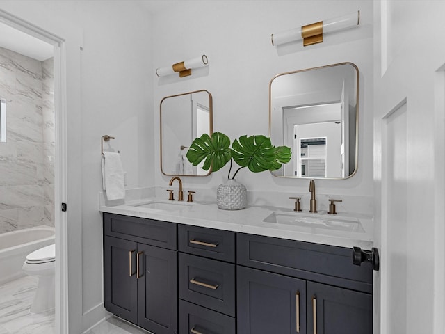 full bathroom with vanity, toilet, and tiled shower / bath combo